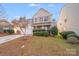 Inviting two-story home with well-maintained lawn and mature landscaping at 8007 Shadbrush Ct, Charlotte, NC 28215