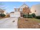 Charming two-story home with a two-car garage and a well-manicured front yard at 8007 Shadbrush Ct, Charlotte, NC 28215