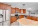 Kitchen featuring stainless appliances, granite countertops, and an island with wood surface at 8007 Shadbrush Ct, Charlotte, NC 28215