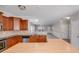 Kitchen featuring stainless appliances, granite countertops, and an island with wood surface at 8007 Shadbrush Ct, Charlotte, NC 28215