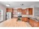Well-equipped kitchen with wood cabinets, stainless steel appliances, and butcher block island at 8007 Shadbrush Ct, Charlotte, NC 28215