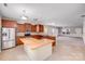 Kitchen featuring stainless appliances, granite countertops, and an island with wood surface at 8007 Shadbrush Ct, Charlotte, NC 28215