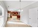 Bright, open kitchen with stainless appliances and an island with wood surface at 8007 Shadbrush Ct, Charlotte, NC 28215