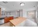 Kitchen featuring stainless appliances, granite countertops, and an island with wood surface at 8007 Shadbrush Ct, Charlotte, NC 28215