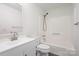 Clean bathroom featuring a tub-shower combo and modern sink and vanity at 8104 Tamalpais Ct, Charlotte, NC 28215