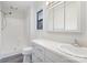 Bathroom featuring a shower, sleek vanity, and updated fixtures at 8104 Tamalpais Ct, Charlotte, NC 28215