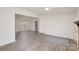 Spacious living room featuring updated flooring and abundant natural light at 8104 Tamalpais Ct, Charlotte, NC 28215