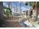 Landscaped backyard with a shed and screened-in porch at 907 Thorn Ridge Ln, Lake Wylie, SC 29710