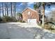 A spacious garage with a large driveway and well-maintained exterior at 907 Thorn Ridge Ln, Lake Wylie, SC 29710