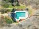 Aerial view of a community swimming pool with surrounding greenery and parking at 907 Thorn Ridge Ln, Lake Wylie, SC 29710