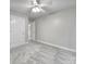 Bedroom with neutral walls, carpet flooring, ceiling fan, and two closets at 907 Thorn Ridge Ln, Lake Wylie, SC 29710