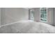 A spacious empty bedroom with multiple windows that allow plenty of natural light in at 907 Thorn Ridge Ln, Lake Wylie, SC 29710