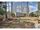 Charming backyard shed with pastel siding, windows, and door at 907 Thorn Ridge Ln, Lake Wylie, SC 29710
