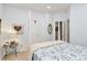 Comfortable bedroom featuring a four poster bed with light bedding and a mirror adding to the calm aesthetic at 9119 Gander Dr, Charlotte, NC 28277
