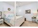 Charming bedroom featuring a four poster bed, complemented by stylish decor and a tranquil ambiance at 9119 Gander Dr, Charlotte, NC 28277