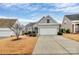 Charming single-Gathering home boasts a two-car garage, manicured landscaping, and a welcoming front entrance at 9119 Gander Dr, Charlotte, NC 28277