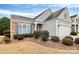 Charming home with stone and siding, a two car garage, and a well maintained yard at 9119 Gander Dr, Charlotte, NC 28277
