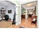 Open hallway that features hardwood floors and an open concept leading into the living and dining room at 9119 Gander Dr, Charlotte, NC 28277