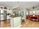 Open living space with kitchen island and a living room view at 9119 Gander Dr, Charlotte, NC 28277