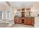 Elegant bathroom boasts dual vanities with granite countertops and a decorative window with a jacuzzi tub at 9135 Fair Oak Dr, Sherrills Ford, NC 28673
