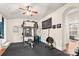 Home gym with weight training equipment and a rubber floor at 9135 Fair Oak Dr, Sherrills Ford, NC 28673