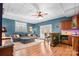 Basement living room with a bar area, a comfortable sectional sofa, and hardwood floors at 9135 Fair Oak Dr, Sherrills Ford, NC 28673