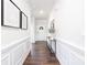 Inviting entryway with a console table, hardwood floors, and bright, neutral walls at 103 Noah Ln, Troutman, NC 28166