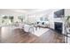 Bright living room with a fireplace, hardwood floors, and large windows at 103 Noah Ln, Troutman, NC 28166