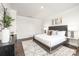 Bright bedroom boasting a large bed, stylish furniture, and plenty of natural light at 103 Noah Ln, Troutman, NC 28166