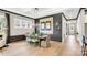 Charming dining room with a rustic wooden table, designer chairs, modern lighting, and elegant decor at 1047 Rabbit Hill Ln, Monroe, NC 28110
