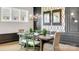 Charming dining room with a rustic wooden table, designer chairs, modern lighting, and elegant decor at 1047 Rabbit Hill Ln, Monroe, NC 28110
