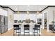 Stylish kitchen with a center island, granite countertops, pendant lighting, and stainless steel appliances at 1047 Rabbit Hill Ln, Monroe, NC 28110