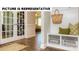 Cozy entryway featuring a bench with storage and a view into the living spaces through french doors at 105 Noah Ln, Troutman, NC 28166