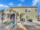 Green home exterior highlighting a screened-in porch and concrete patio at 1062 Baldwin Dr, Lancaster, SC 29720