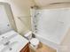 Well-lit bathroom featuring a tub-shower combo, toilet, and single sink vanity with neutral wall and floor tones at 1062 Baldwin Dr, Lancaster, SC 29720