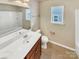 Bathroom features a single sink vanity with a shower and tub at 1062 Baldwin Dr, Lancaster, SC 29720