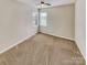 Cozy bedroom with neutral carpeting and ample natural light at 1062 Baldwin Dr, Lancaster, SC 29720