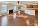 Sunlit open-concept living area boasting hardwood floors and seamless flow to the kitchen at 1062 Baldwin Dr, Lancaster, SC 29720