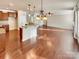 Open-concept living space featuring hardwood floors and natural light at 1062 Baldwin Dr, Lancaster, SC 29720