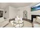 Tastefully decorated living room with a fireplace, comfortable seating, and stylish accents at 109 Noah Ln, Troutman, NC 28166