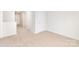 Hallway featuring carpeted floors and white doors at 111 Rustling Waters Dr, Mooresville, NC 28117