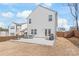 Spacious backyard with patio, dining set, grill, and a fenced perimeter, great for outdoor enjoyment at 112 Buoy Ln, Statesville, NC 28677