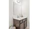 Bathroom vanity with a modern design, undermount sink, and a sleek faucet at 112 Buoy Ln, Statesville, NC 28677