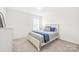 Bright bedroom with lots of sunlight, a comfortable bed, and simple, stylish decor at 112 Buoy Ln, Statesville, NC 28677