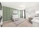 Charming Bedroom with a modern design and features a crib, chair, and stylish decor at 112 Buoy Ln, Statesville, NC 28677