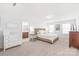 Well-lit bedroom featuring carpeted floors and neutral paint at 112 Buoy Ln, Statesville, NC 28677