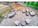 Wonderful view of the custom patio with furniture in this private back yard with mature trees at 1126 Snowbird Ln, Waxhaw, NC 28173