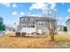 Charming backyard features a patio area and view of the siding of the home at 1126 Snowbird Ln, Waxhaw, NC 28173