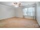 Spacious bedroom with large window and neutral tones, offering a bright and airy feel at 1126 Snowbird Ln, Waxhaw, NC 28173
