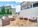 Relaxing patio space with outdoor seating and a view of the deck and yard at 1126 Snowbird Ln, Waxhaw, NC 28173